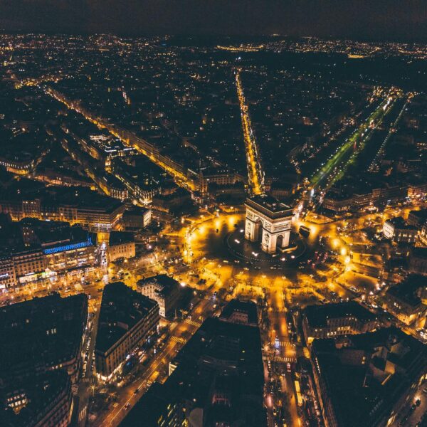 Arc de Triomphe at Place Charles de Gaule at night in Paris